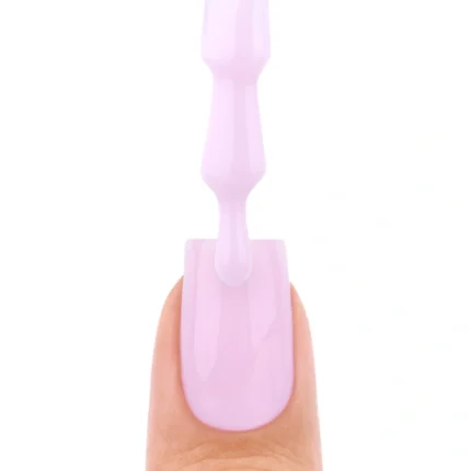 Nails Company Smart Base Pro - zbliżenie pędzla aplikatora z kolorem Rose Skin na paznokciu, odcień jasnoróżowy liliowy