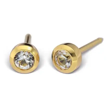Kolczyki STUDEX System75 7511-0260 z bezbarwną cyrkonią 3 mm w pełnej oprawie, kolor złoty